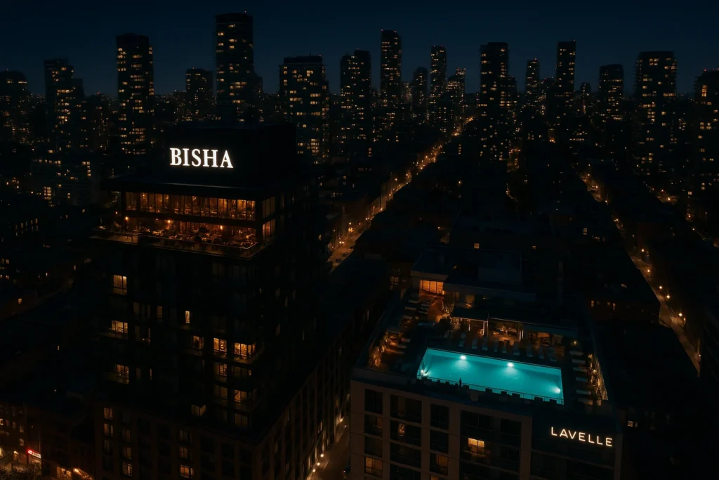Night aerial of King West skyline highlighting Bisha Hotel rooftop lounge and Lavelle pool.